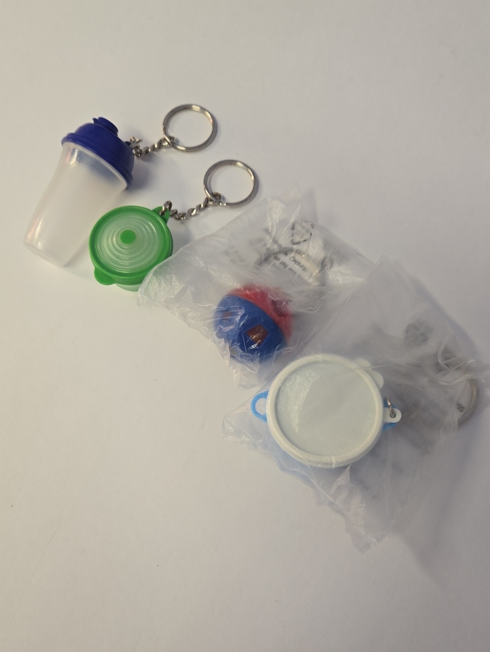 Vntg Tupperware Mini Key Chains Set Of 4 EUC/NIB